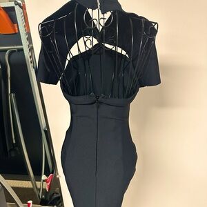 Black Astoria dress size xs never worn. Spandex material